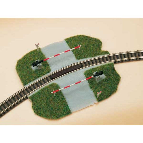 Level crossing with barrier (N)