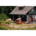 Black Forest house with figure Anniversary model (H0)