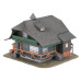 Black Forest house with figure Anniversary model (H0)
