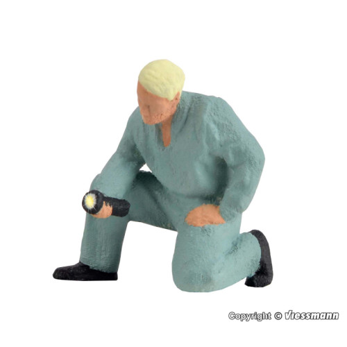 Car mechanic with lamp (H0)